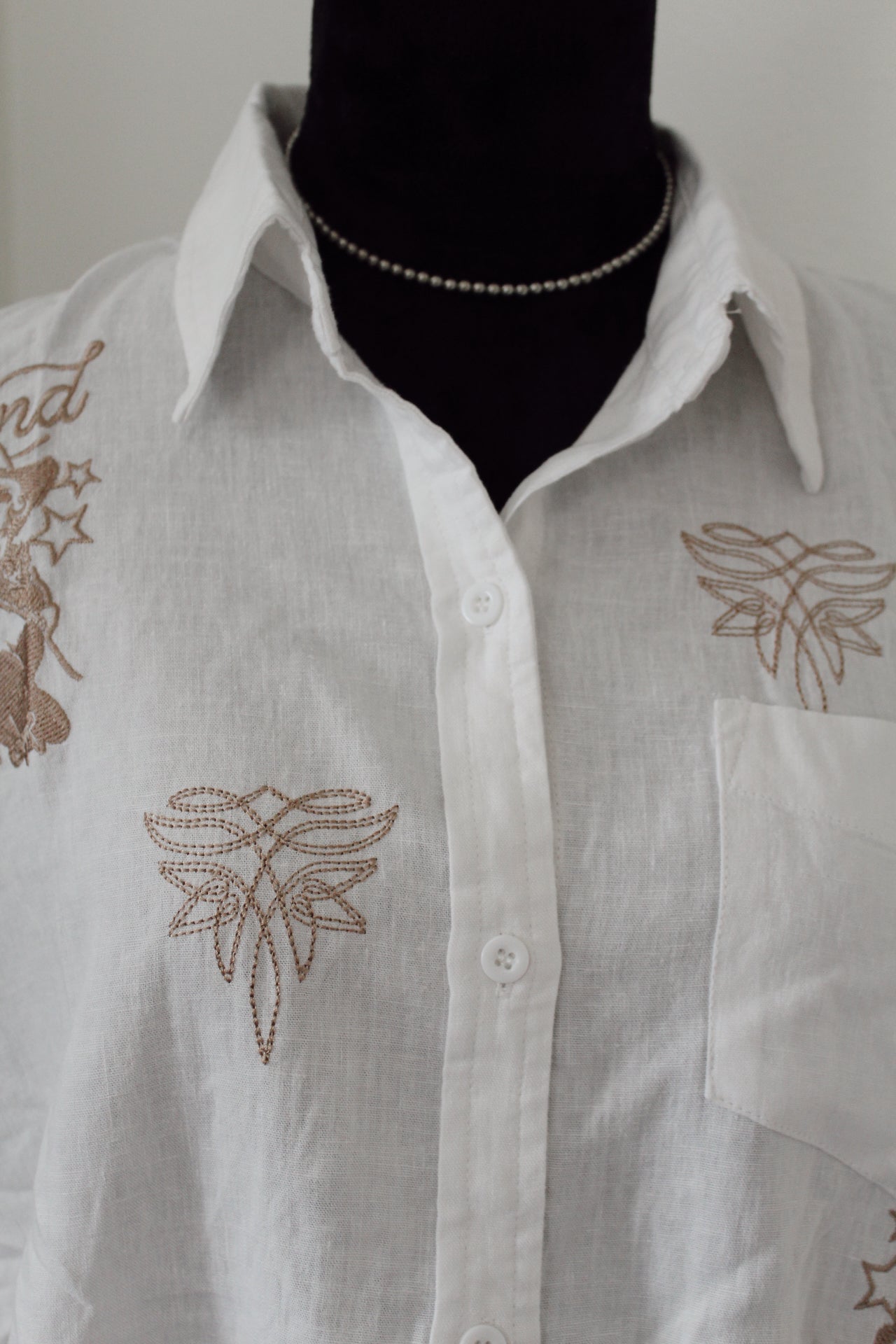Secretariat's linen blouse